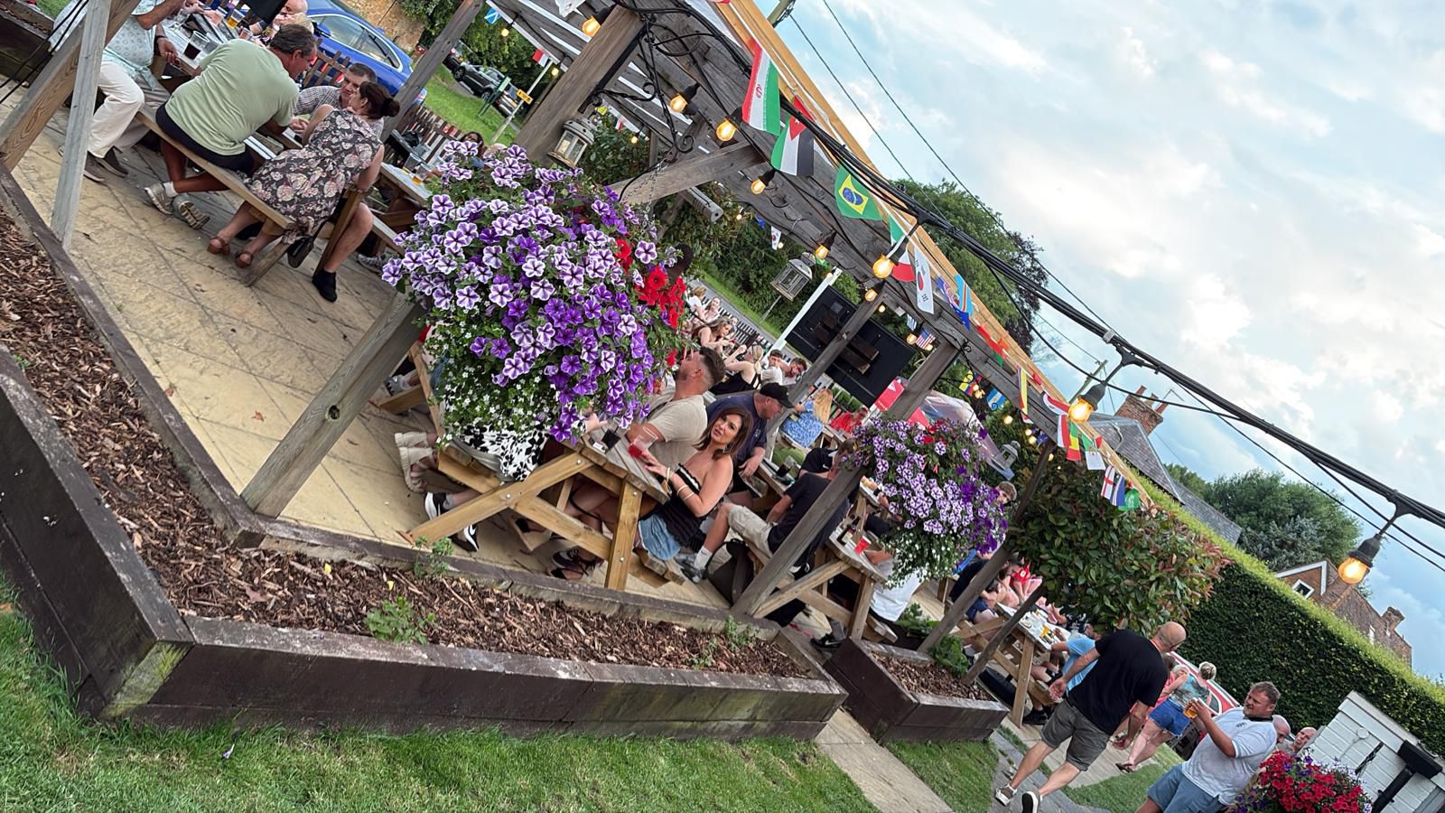 Colourful flowers in bloom in the garden at The Chandos Arms.